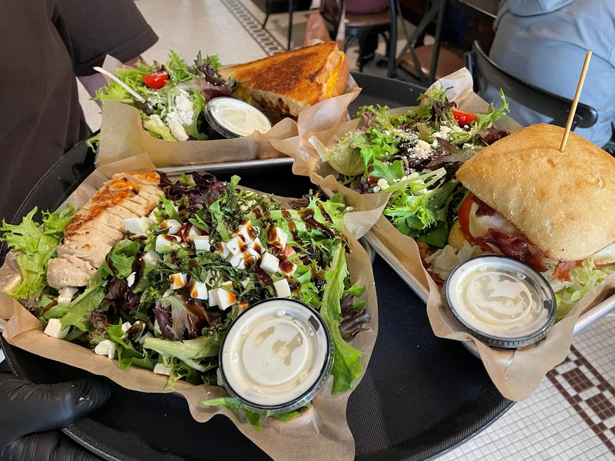 assorted salads and burgers